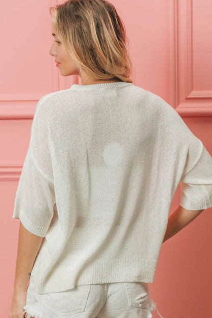 Off-white BiBi striped heart contrast knit top by Trendsi, featuring a cozy design with bold stripe and heart pattern.