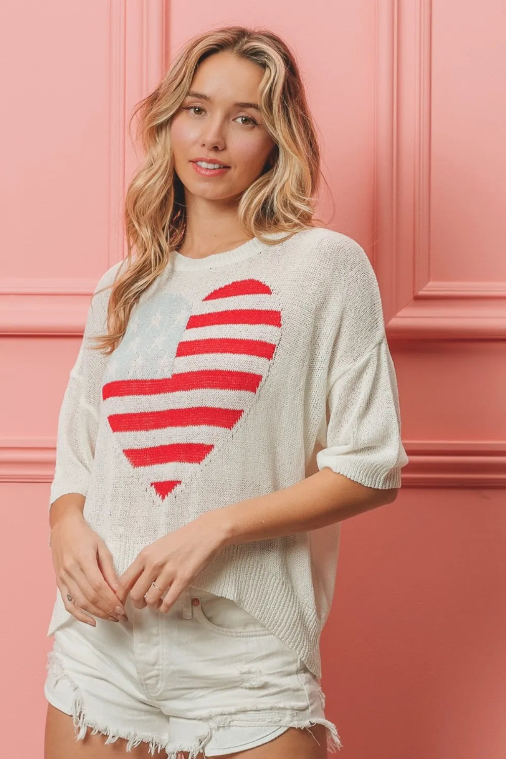Off-white BiBi striped heart contrast knit top by Trendsi, featuring a cozy knit fabric and playful heart pattern.
