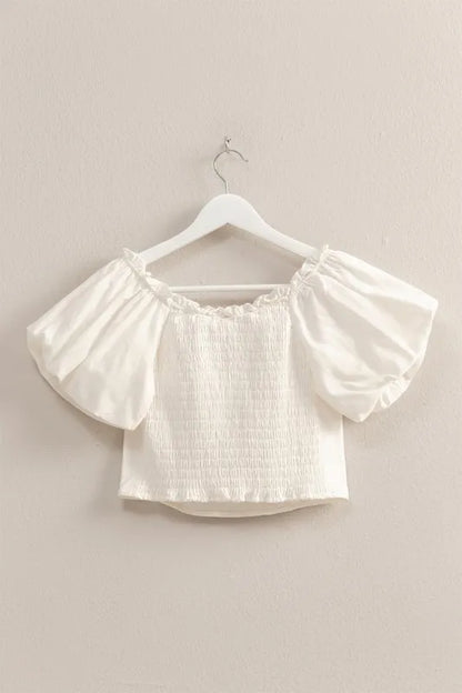 Off-white HYFVE puff sleeve sweetheart neckline top with ruffled details, stylish and feminine for casual or dressy wear.