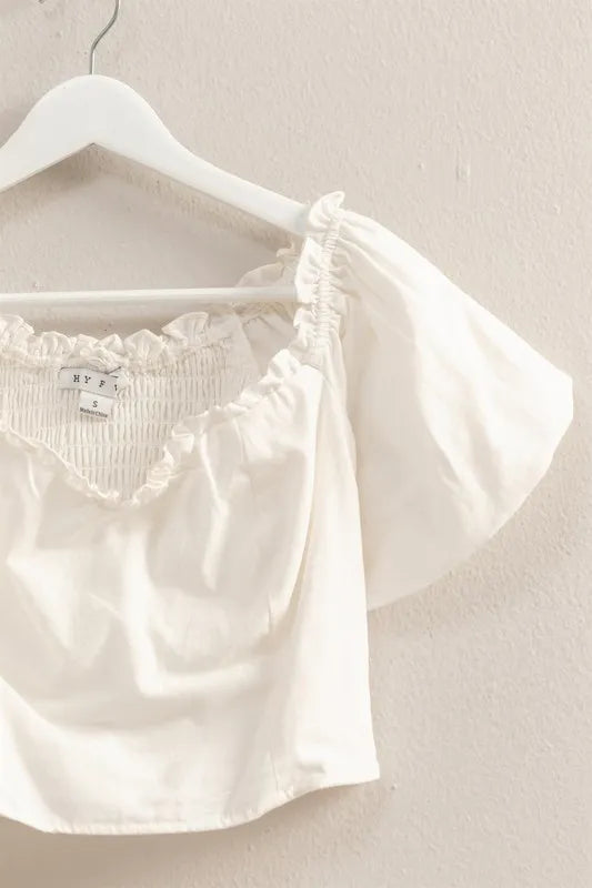 Off-white puff sleeve sweetheart neckline top by HYFVE, featuring a fitted bodice and feminine design.