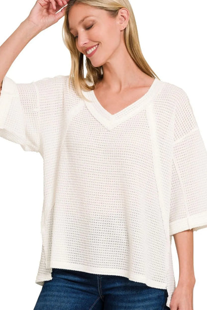 Off-white Zenana brushed waffle top with exposed seams and 3/4 sleeves, casual and cozy for everyday wear.