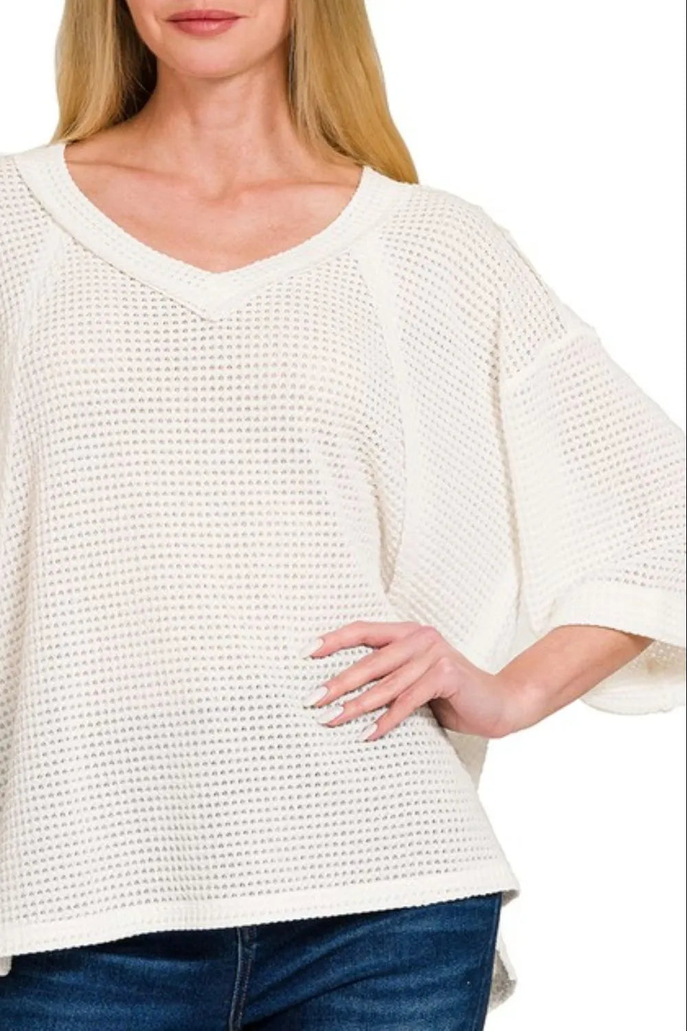 Off-white Zenana brushed waffle 3/4 sleeve top with exposed seam, casual and cozy style, from Trendsi.