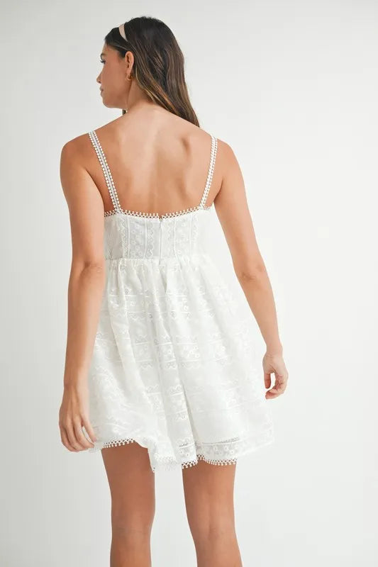 Off-white MABLE Eyelet Lace Babydoll Mini Cami Dress with delicate lace details, perfect for a stylish, feminine look.