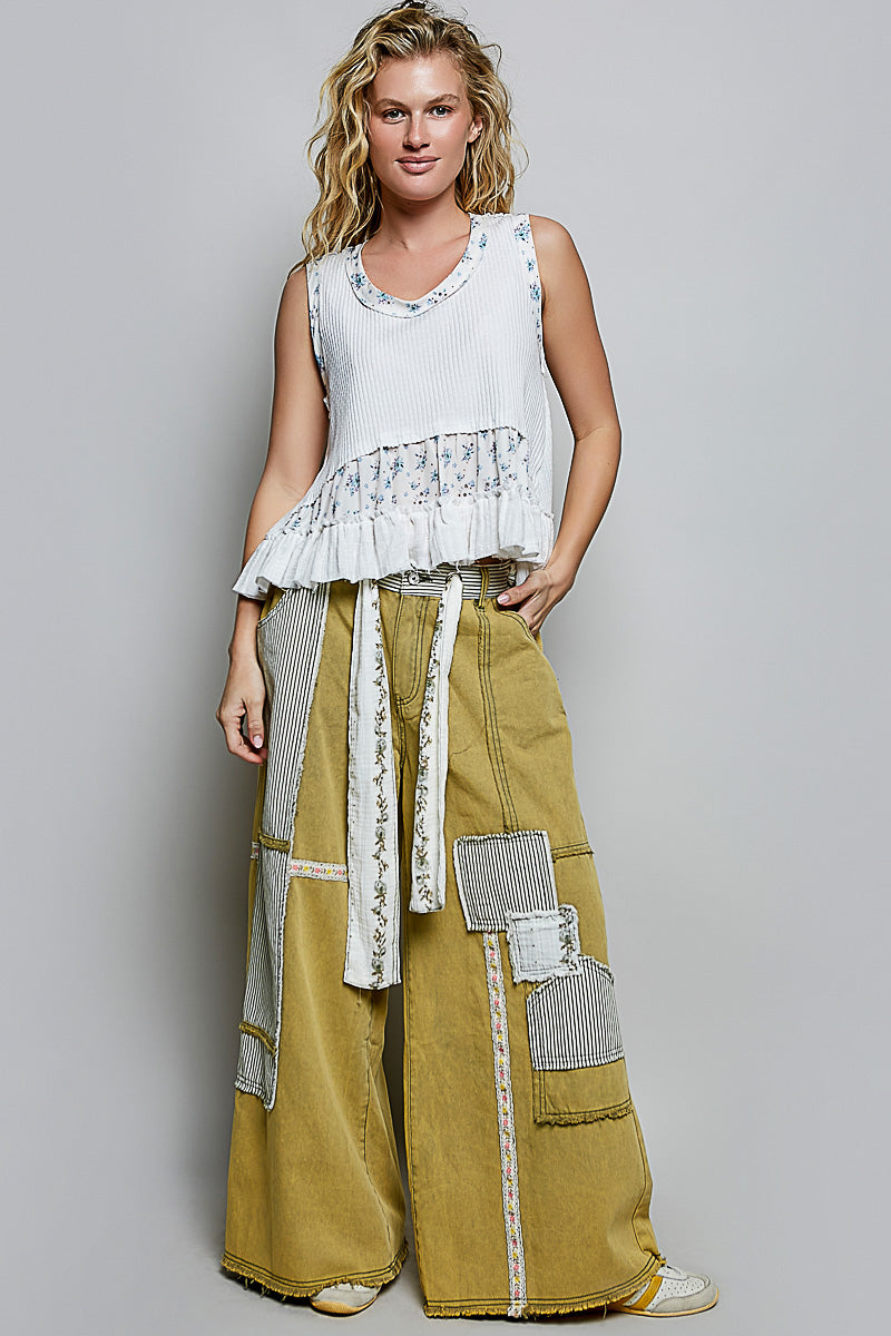 Off-white floral print POL ribbed tank top with round neck and double gauze ruffle accents by Trendsi.