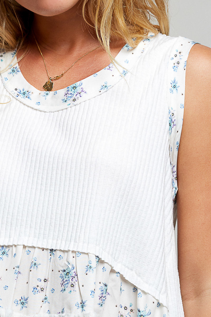 Off-white floral print POL ribbed tank top with round neck and double gauze ruffle accents, from Trendsi.