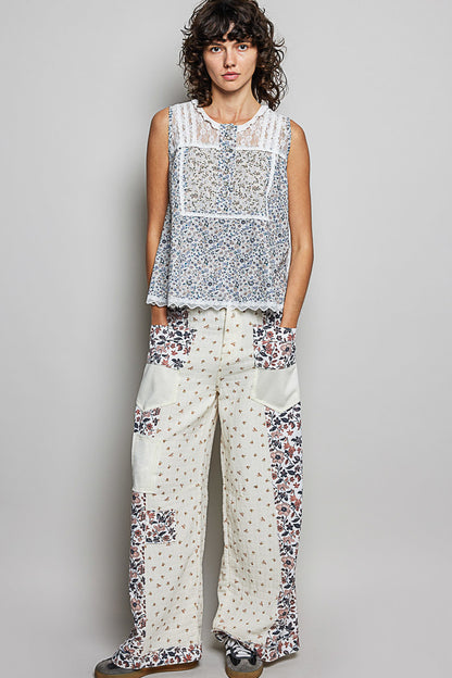 Off-white POL printed woven sleeveless top with lace-back and round neckline, stylish and lightweight from Trendsi.
