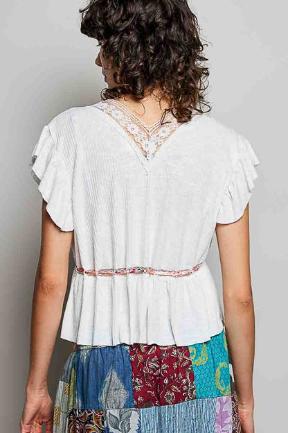 Off-white Trendsi POL tied ruffled V-neck short sleeve blouse with lace detail, showcasing feminine design and elegant fabric.