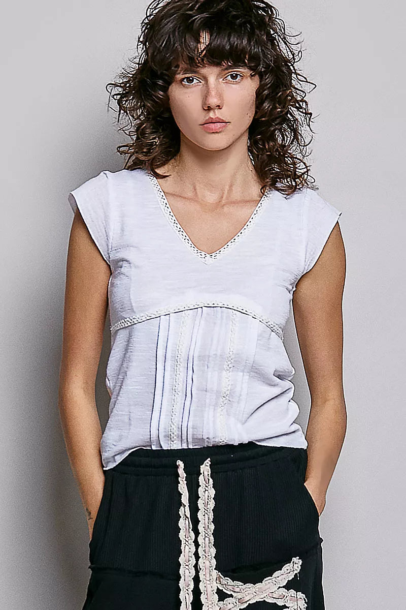 Off-white POL V-neck lightweight textured short sleeve knit top with lace trim by Trendsi, shown on a model.