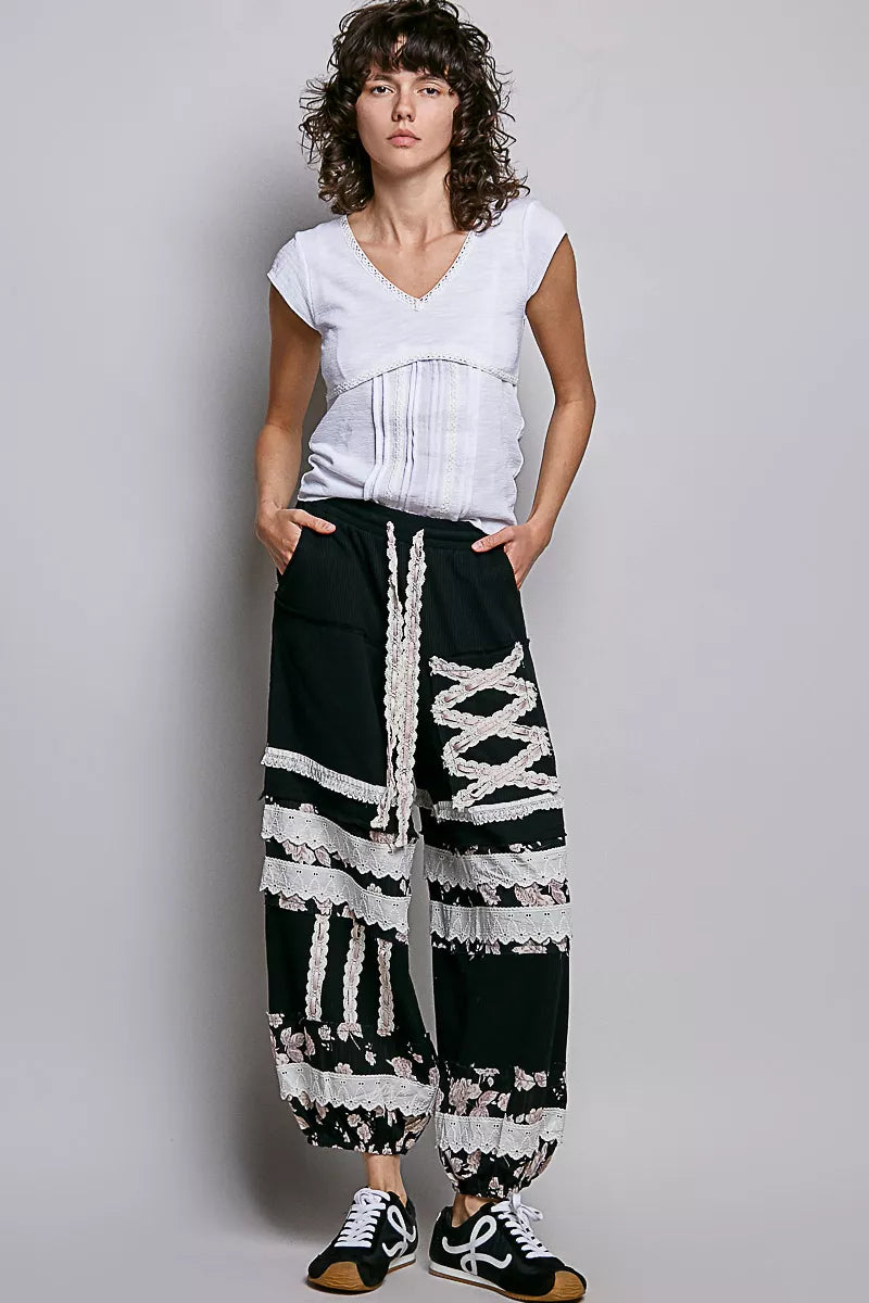 Off-white Trendsi V-neck lightweight textured knit top with short sleeves and delicate lace trim, casual and stylish for warm weather.