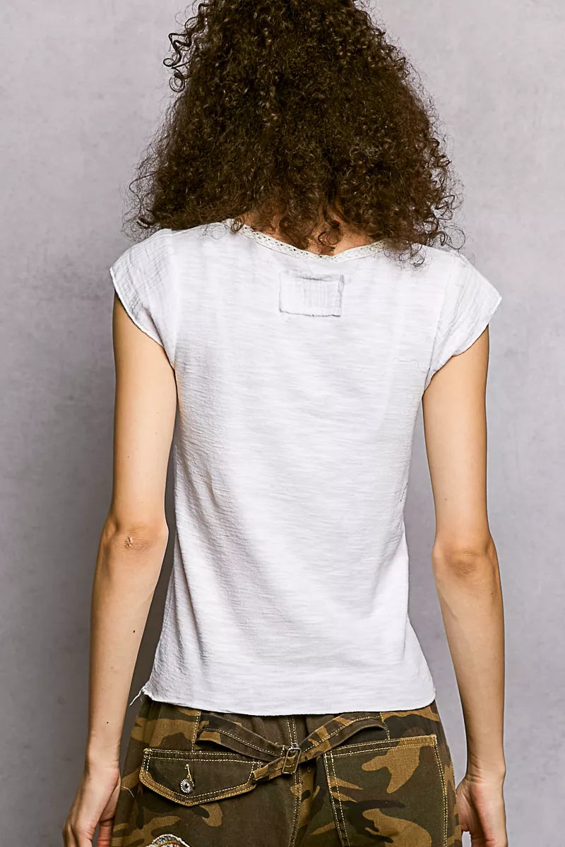 Off-white Trendsi V-neck short sleeve knit top with textured fabric and delicate lace trim, lightweight and stylish.