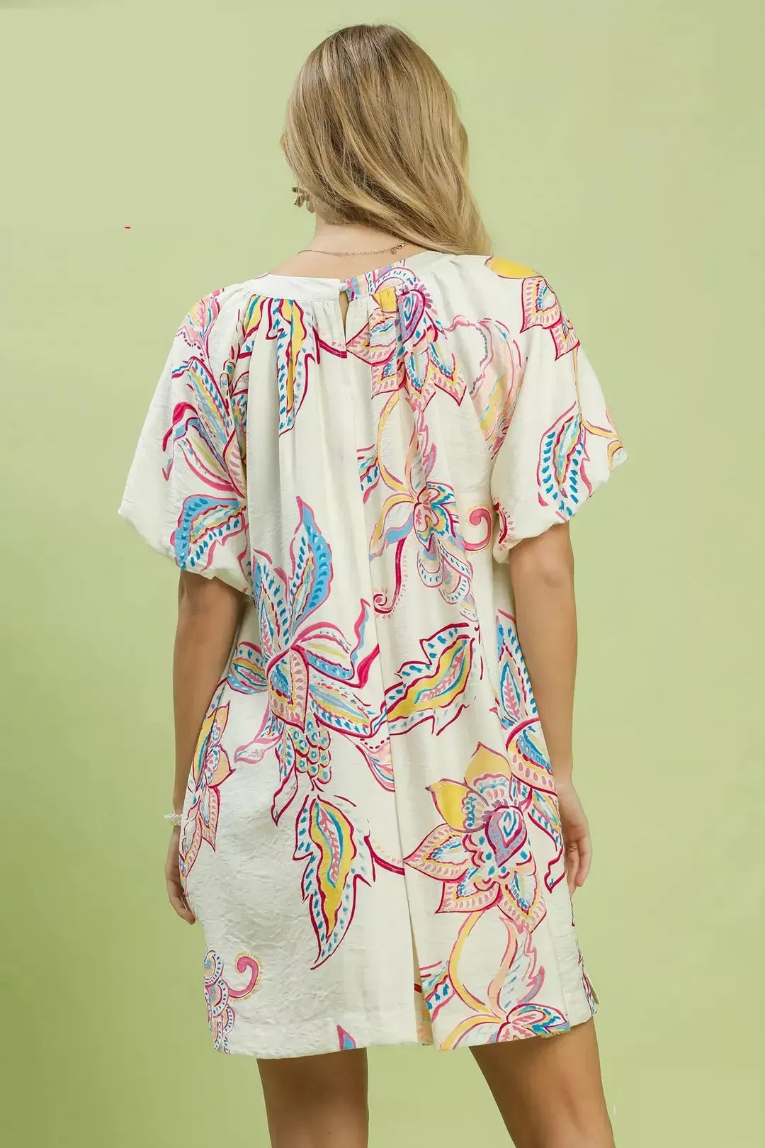 Off-white Umgee boho floral print mini dress with pockets, casual summer dress with relaxed fit and stylish design.