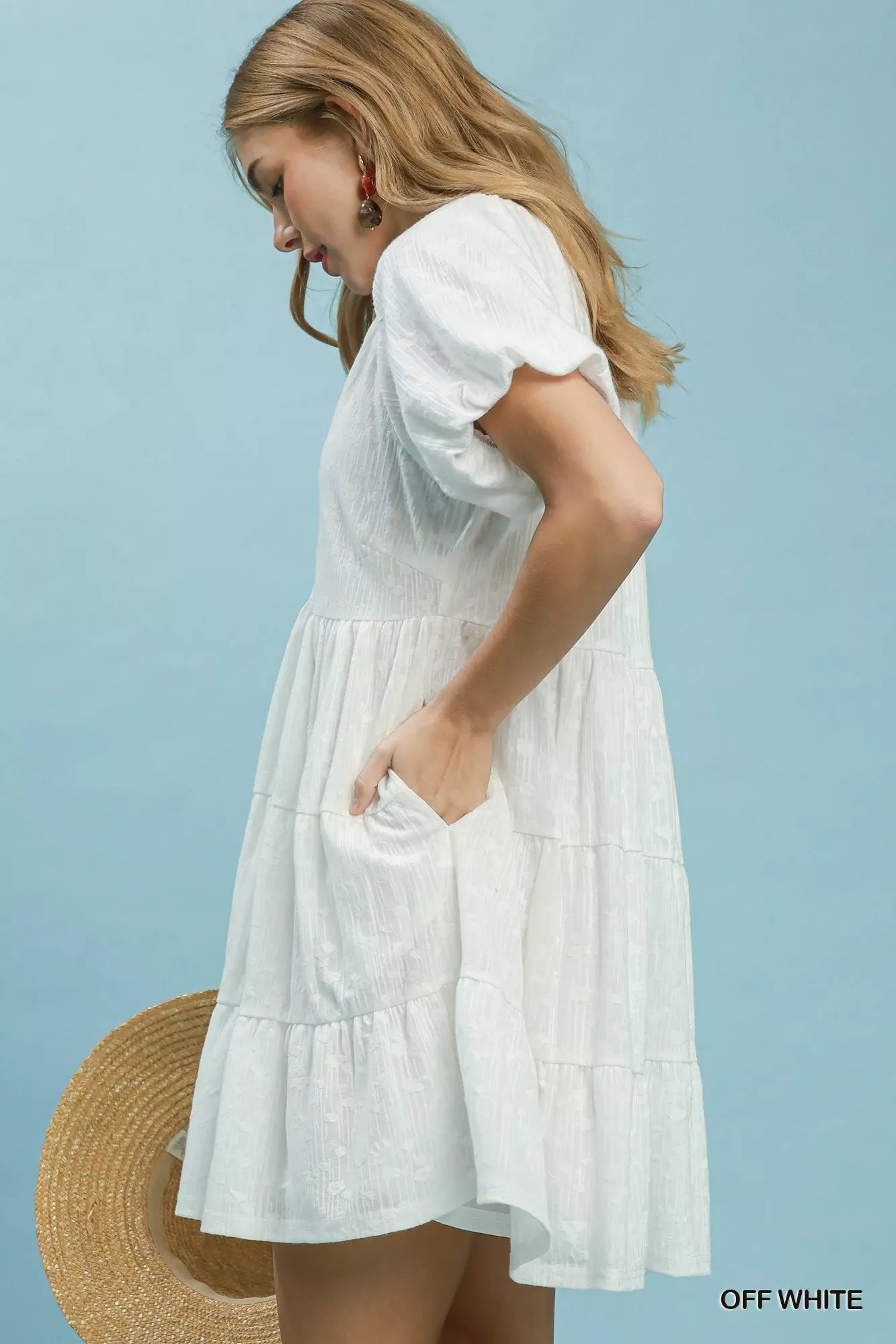 Off-white Umgee Jacquard Puff Sleeve Mini Dress with intricate pattern and stylish puff sleeves, perfect for casual or dressy occasions.