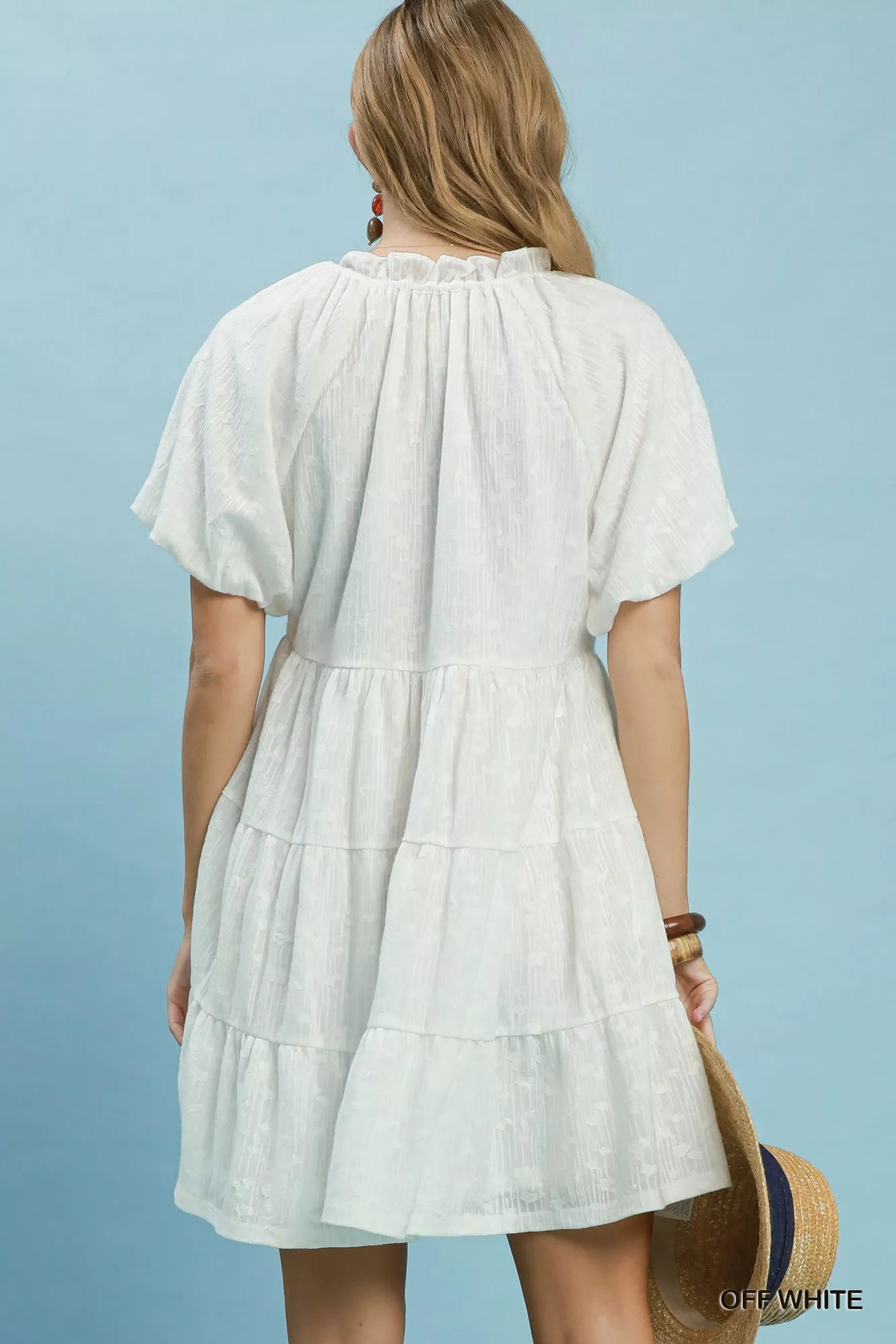 Off-white Umgee Jacquard Puff Sleeve Mini Dress with detailed pattern and feminine silhouette, styled for casual or dressy occasions.