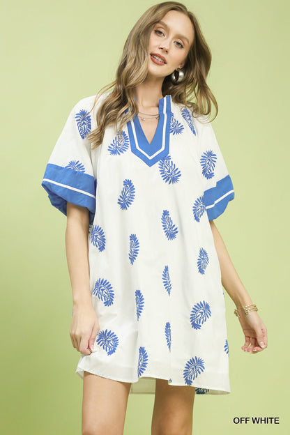 Off-white Umgee boho mini dress with paisley embroidery, featuring a relaxed fit and stylish design.