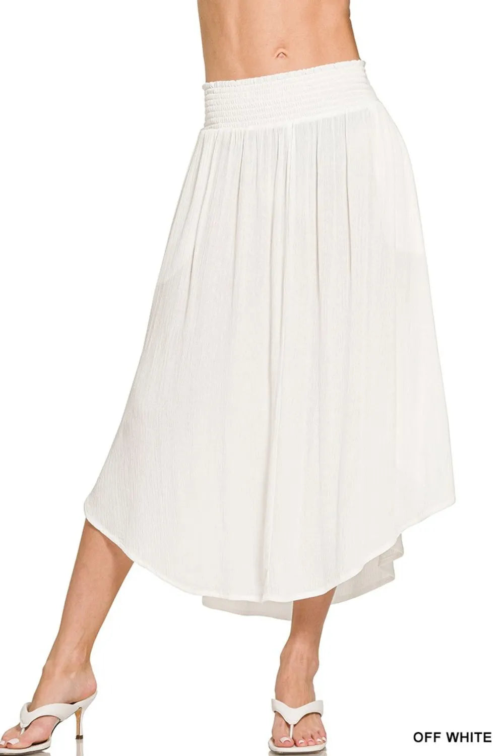 Off-white Zenana woven crinkle maxi skirt with smocked waist and pockets, featuring a flowing, comfortable design.