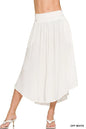 Off-white Zenana woven crinkle maxi skirt with smocked waist and pockets, featuring a flowing, comfortable design.