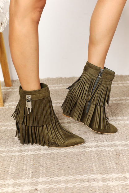 Olive green Legend Women's Tassel Wedge Heel Ankle Booties by Trendsi, featuring tassel details and a stylish wedge heel.