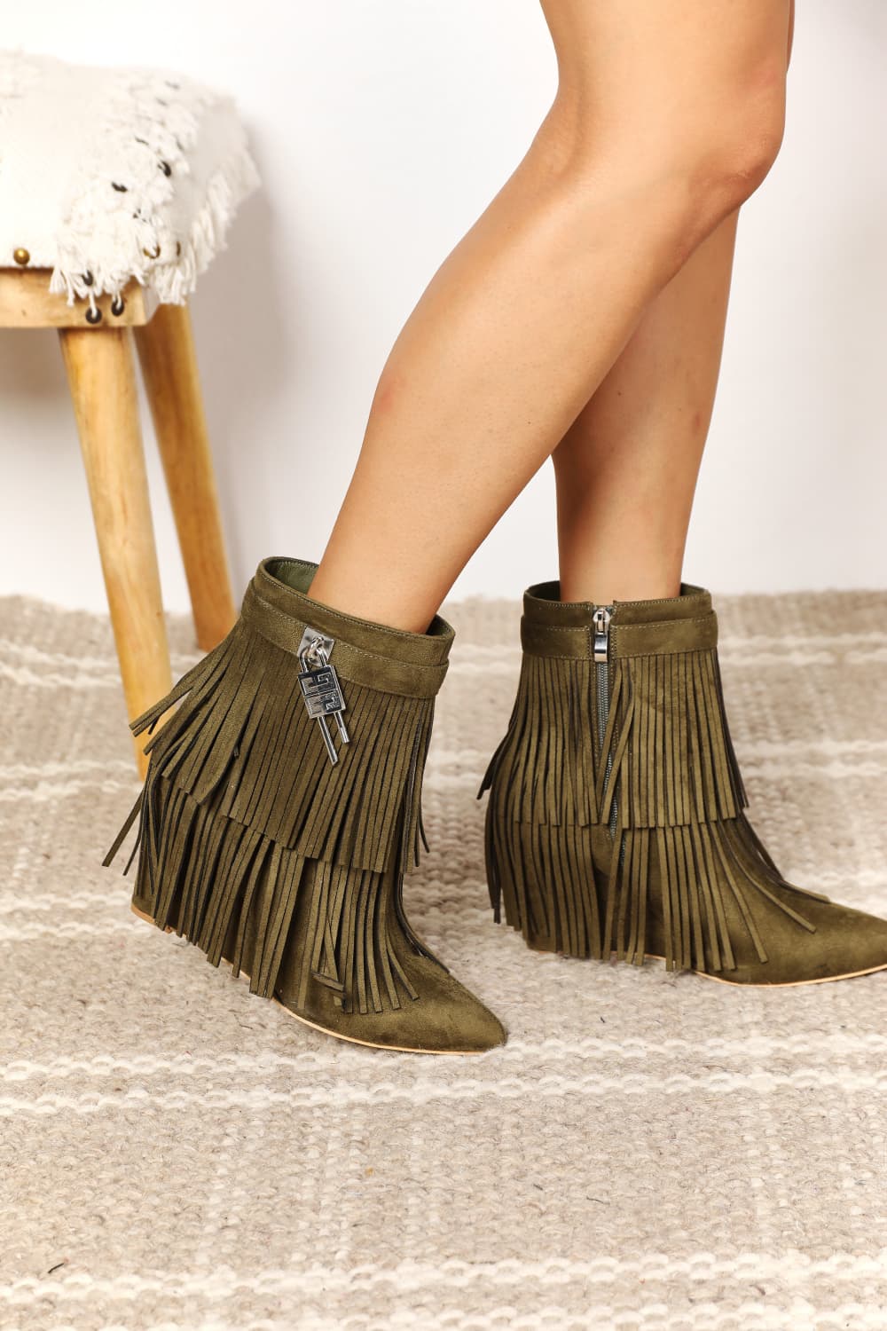 Olive green Legend Women's Tassel Wedge Heel Ankle Booties by Trendsi with tassel details and ankle-high design.