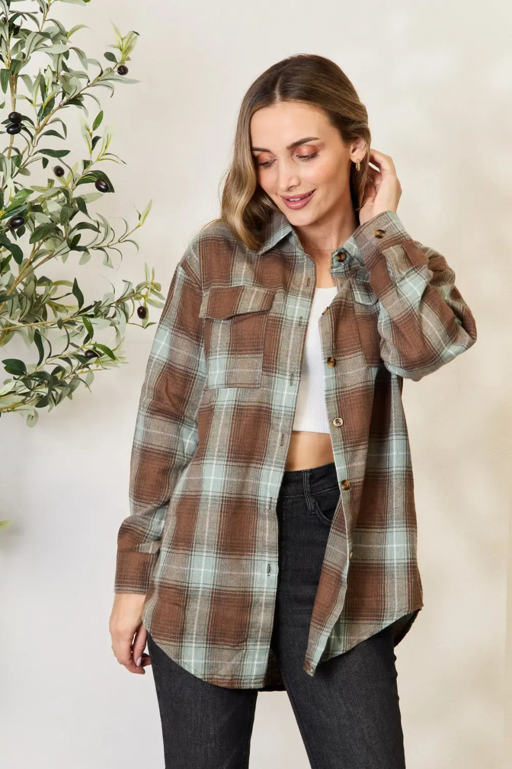 Olive brown Mandy plaid dropped shoulder shirt by Trendsi, featuring a relaxed fit and casual plaid pattern.