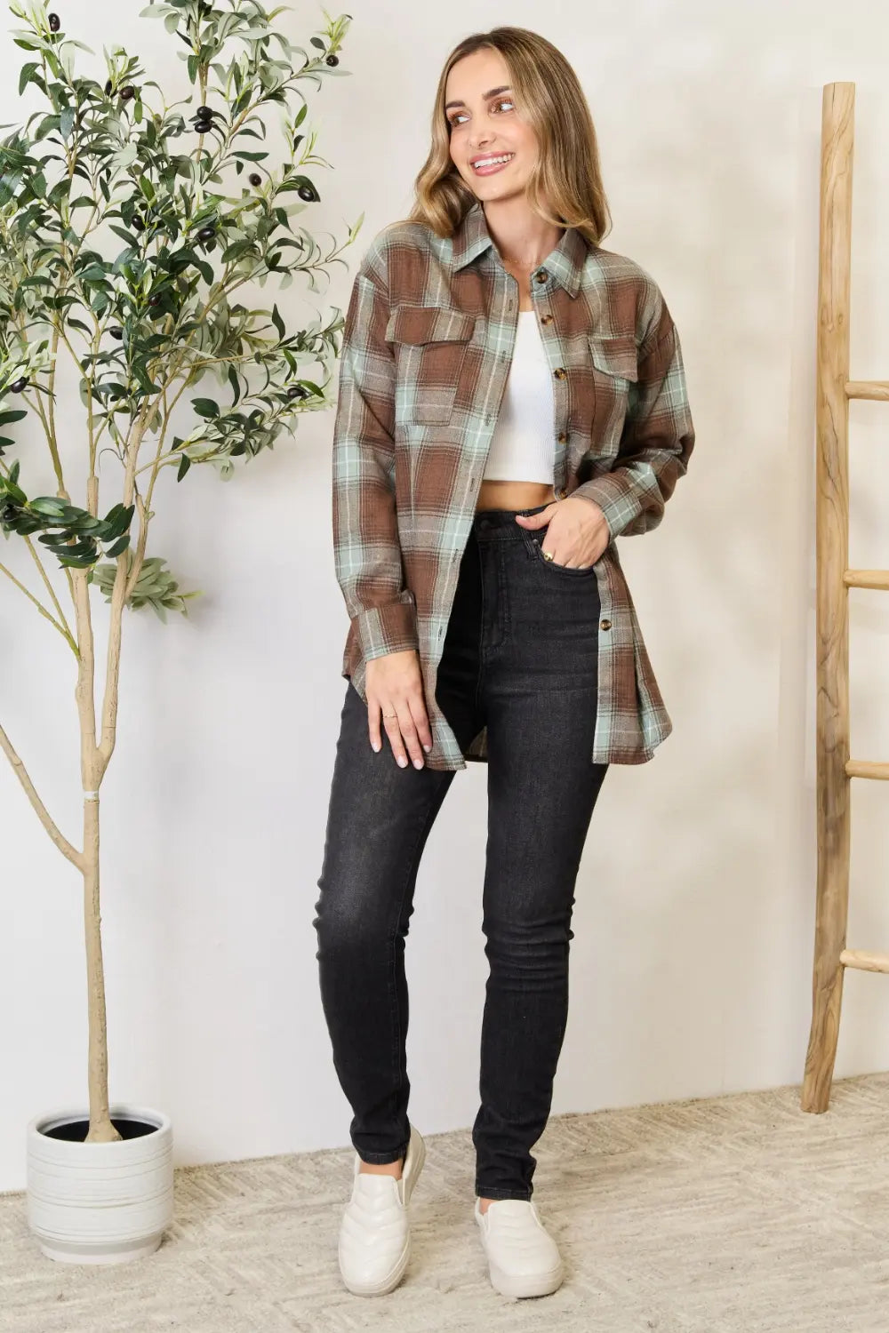 Olive brown Mandy plaid dropped shoulder shirt by Trendsi, featuring a relaxed fit, long sleeves, and casual plaid design.