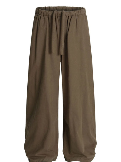 Men's wide leg drawstring elastic waist pants in olive brown, casual style with comfortable fit and relaxed design.