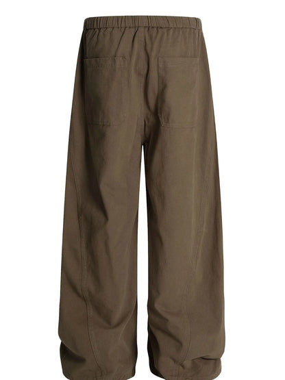 Men's olive brown wide-leg drawstring elastic waist pants by Trendsi, featuring a relaxed fit and comfortable waistband.