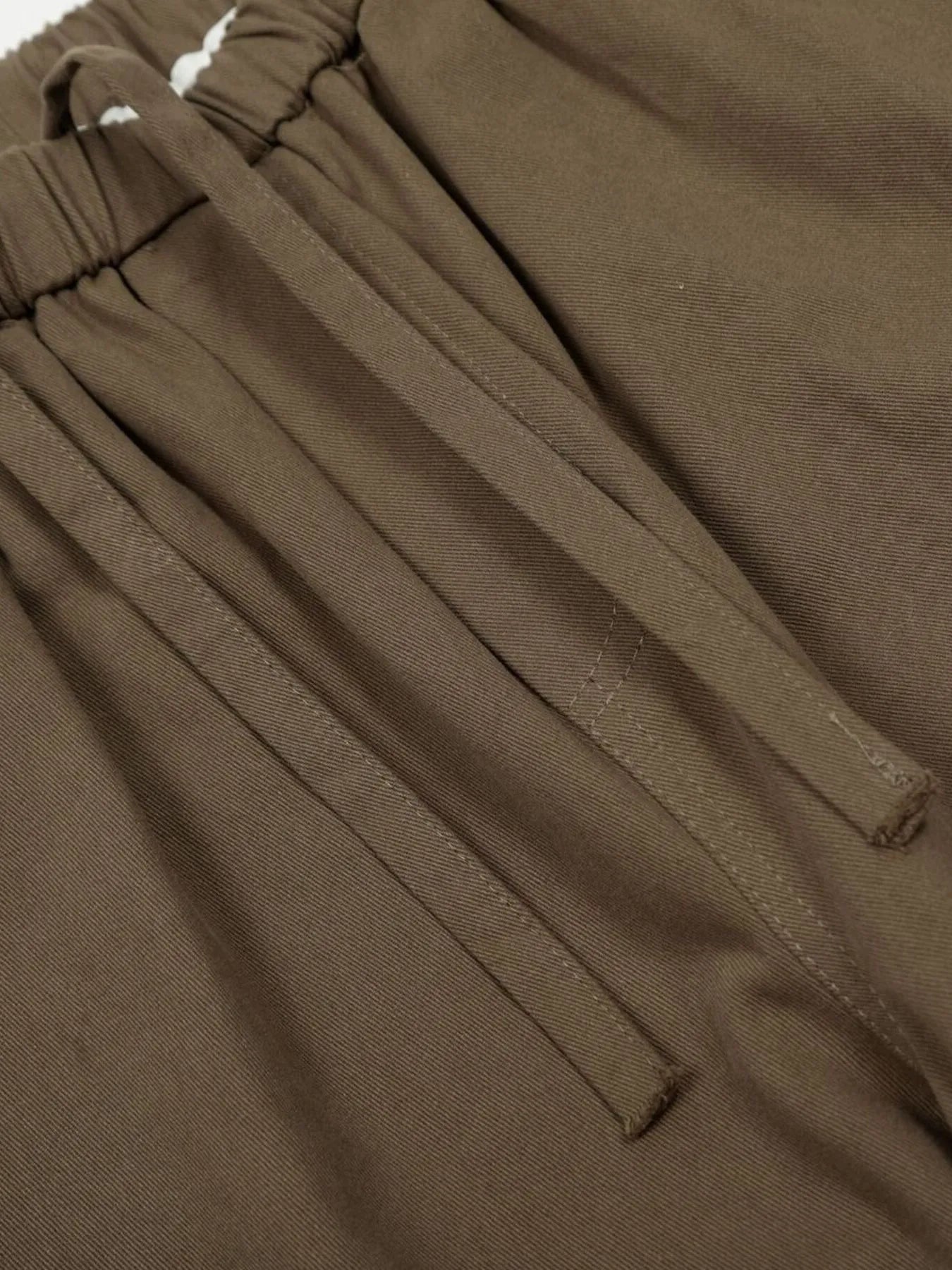 Men's olive brown wide-leg drawstring pants with elastic waistband, casual style from Trendsi.