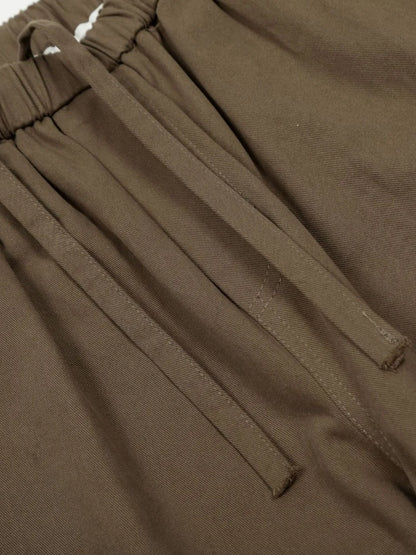 Men's olive brown wide-leg drawstring pants with elastic waistband, casual style from Trendsi.