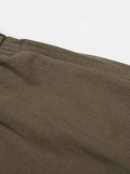 Men's olive brown wide leg drawstring elastic waist pants from Trendsi, featuring a relaxed fit and comfortable design.