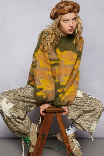 Olive and multi-color abstract pattern mock neck sweater by Trendsi, featuring colorblock design and cozy knit fabric.