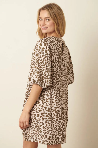 Olive green animal print puff sleeve mini dress by Mittoshop, featuring a fitted silhouette and stylish design.