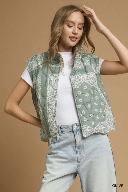 Olive green Umgee bandana print quilted puffer vest with stand collar and front zipper, stylish and warm outerwear.