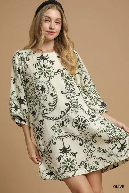 Olive green Umgee boho printed balloon sleeve mini dress with a relaxed fit and stylish design, perfect for casual wear.