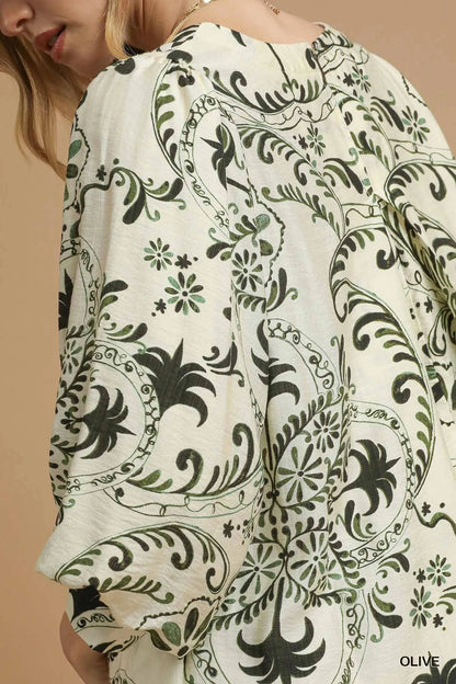 Olive green Umgee boho printed mini dress with balloon sleeves, featuring a stylish, relaxed fit and bohemian pattern.