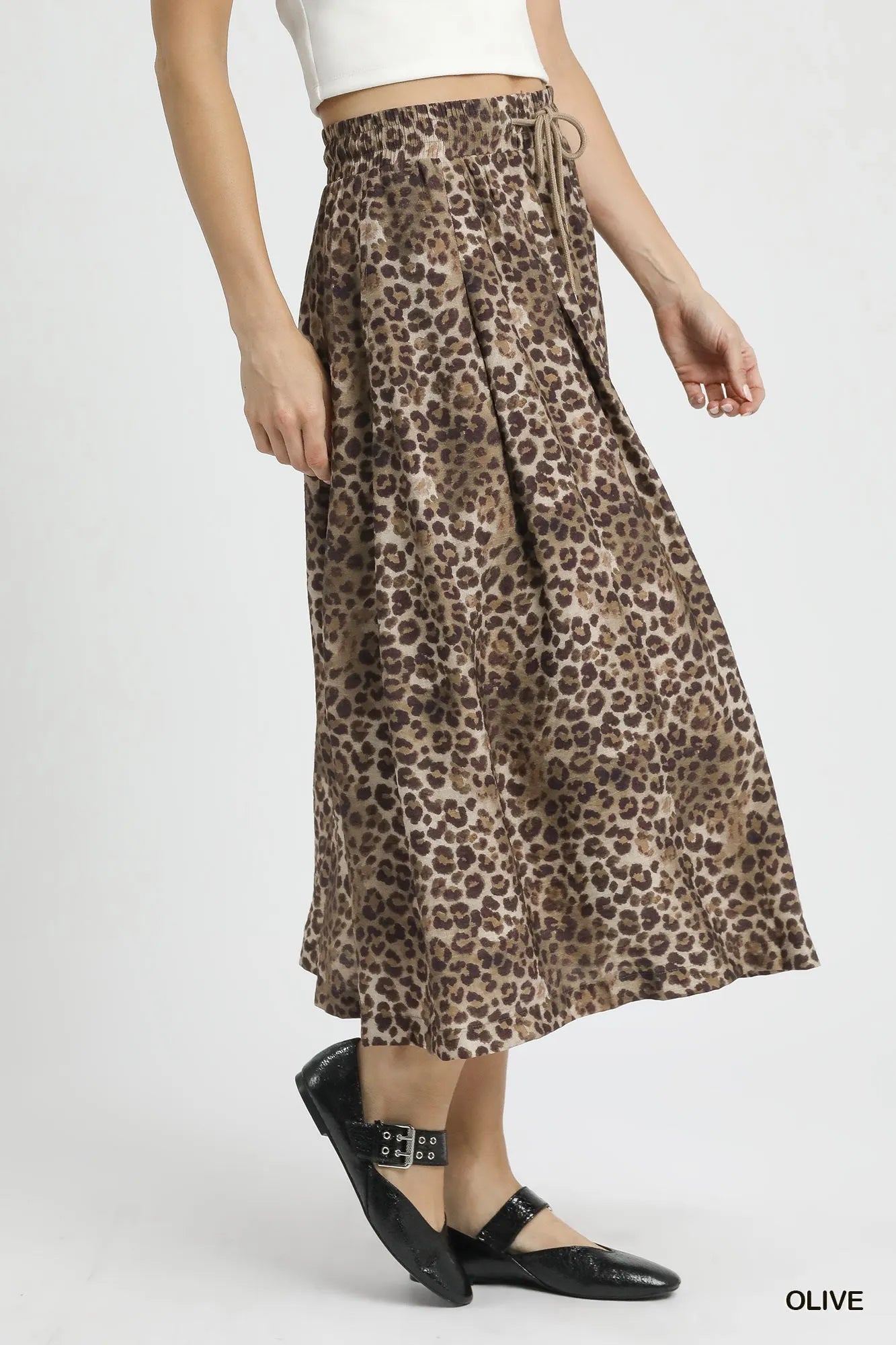 Olive green Umgee drawstring leopard midi skirt with a relaxed fit and stylish print, perfect for casual or chic outfits.