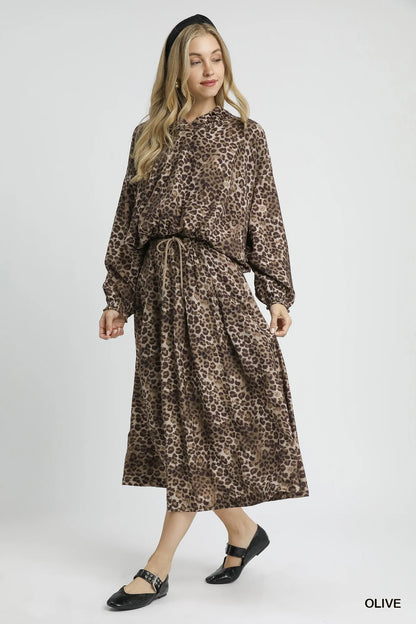 Olive green Umgee leopard print midi skirt with drawstring waist, stylish and flowy for casual or dressy looks.