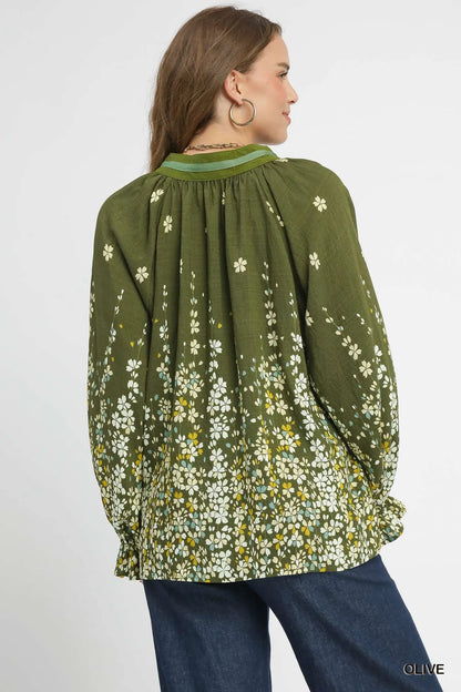 Olive green Umgee floral vine print blouse with balloon sleeves, featuring a relaxed fit and feminine style.