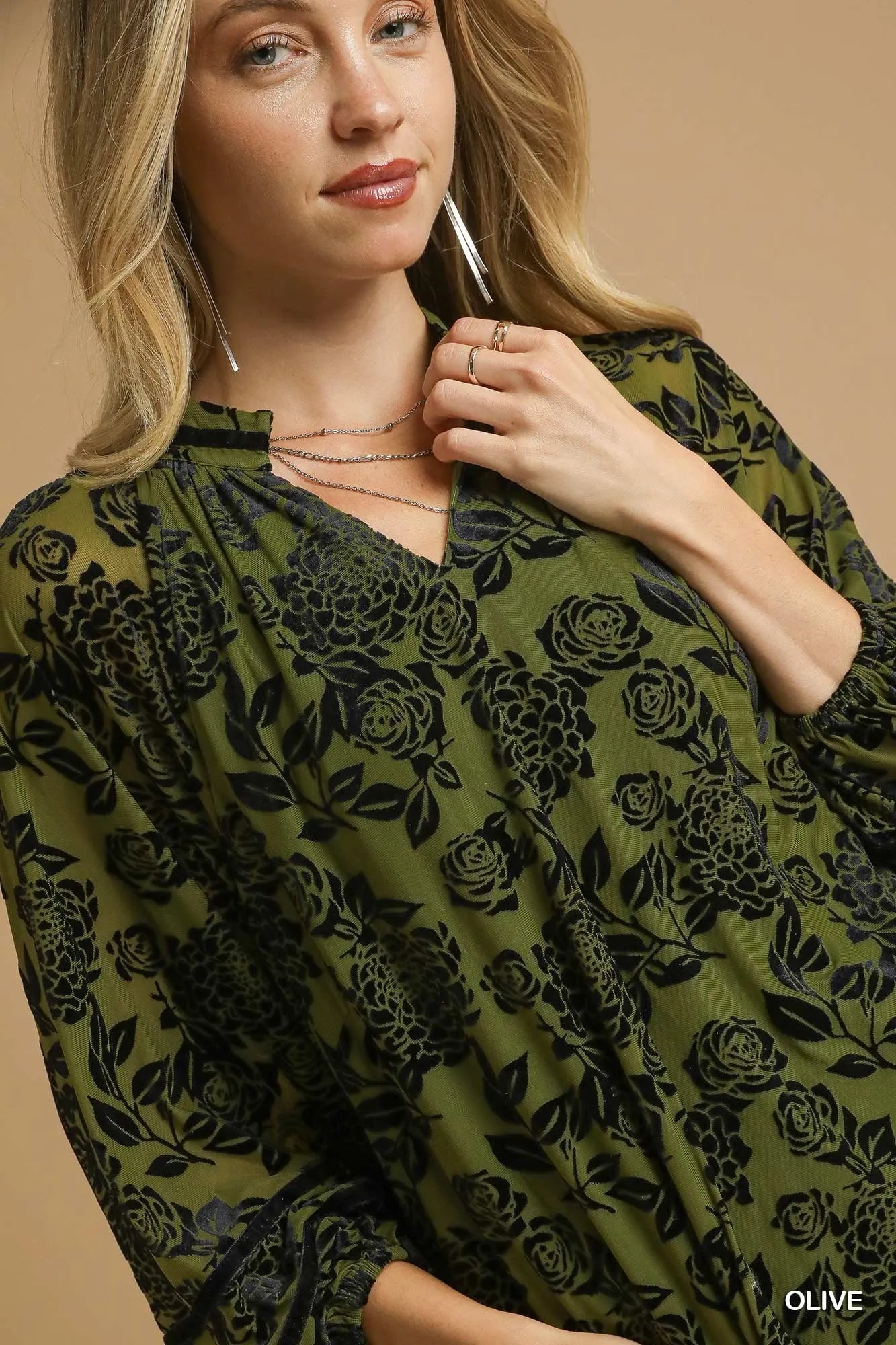 Plus size floral velvet blouse by Umgee with balloon sleeves, featuring a full-size fit and floral pattern.