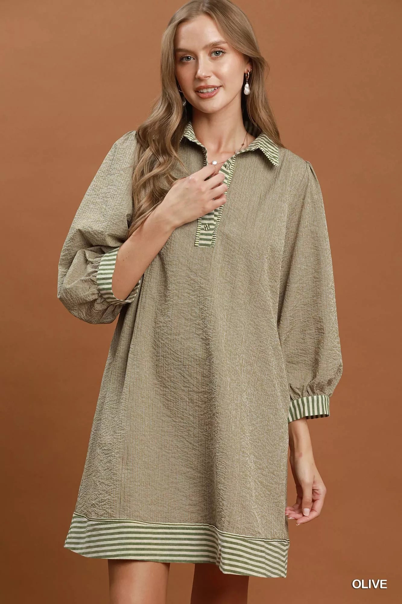Olive green Umgee striped contrast belted puff sleeve mini dress with a fitted waist and stylish design.