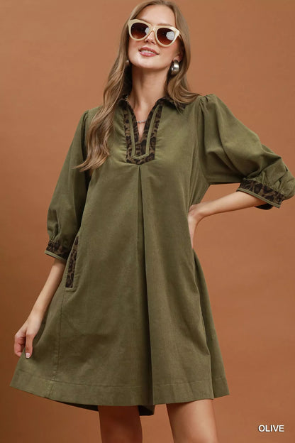 Olive green Umgee V-Neck Shift Dress with contrast trim, casual style, short sleeves, and relaxed fit.