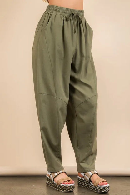 Olive green Very J Solid Barrel Comfy Woven Pants from Trendsi, showing relaxed fit and soft fabric texture.
