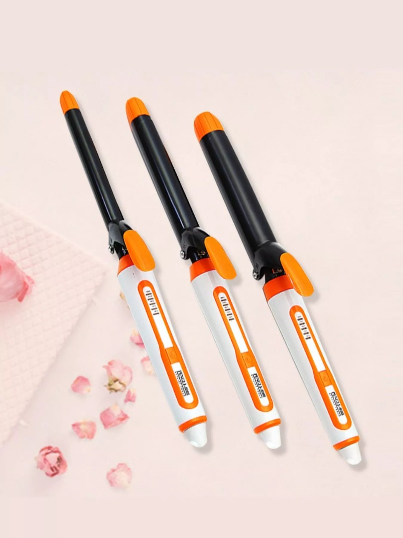 Orange and black Trendsi adjustable temperature curling iron wand with a 19mm barrel and European plug, suitable for creating curls.