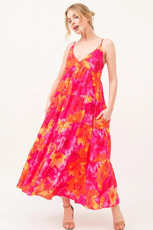 Orange multi floral tiered maxi cami dress with pockets by Trendsi, featuring a flowy design and adjustable straps.