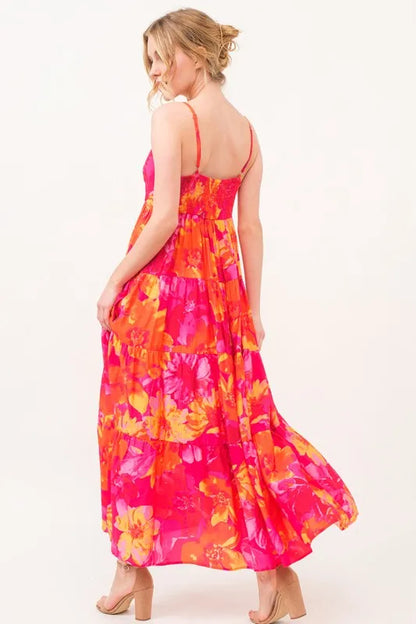 Orange multi floral tiered maxi cami dress with pockets by Trendsi, featuring a flowy design and adjustable straps.