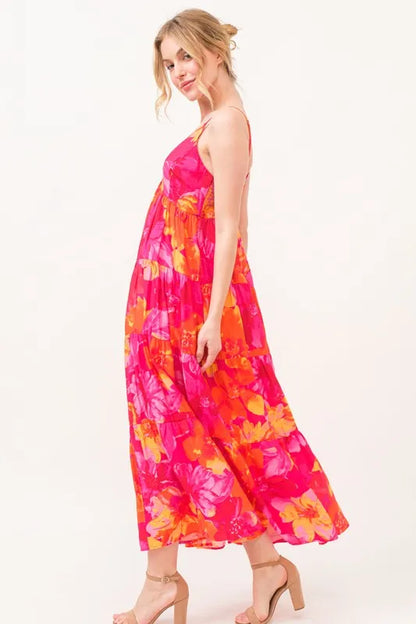 Orange multi floral tiered maxi cami dress with pockets from Trendsi, featuring a flowing silhouette and adjustable straps.