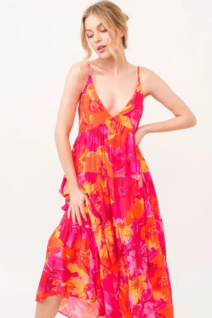 Orange multi floral tiered maxi cami dress with pockets from Trendsi, featuring a flowy silhouette and adjustable straps.