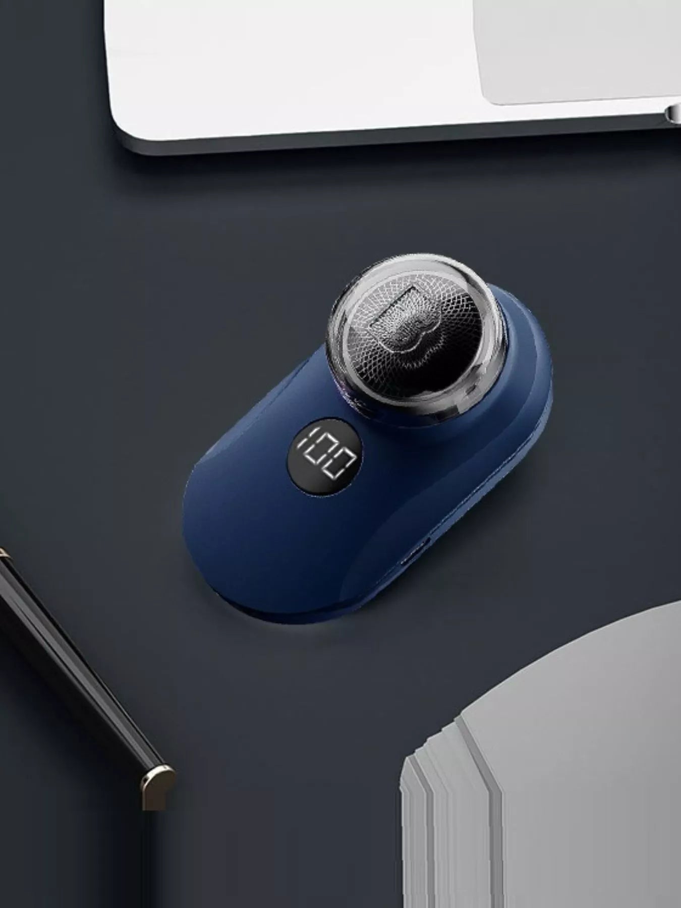 Trendsi portable mini electric shaver in orange, compact design with a single size for easy grooming and portability.