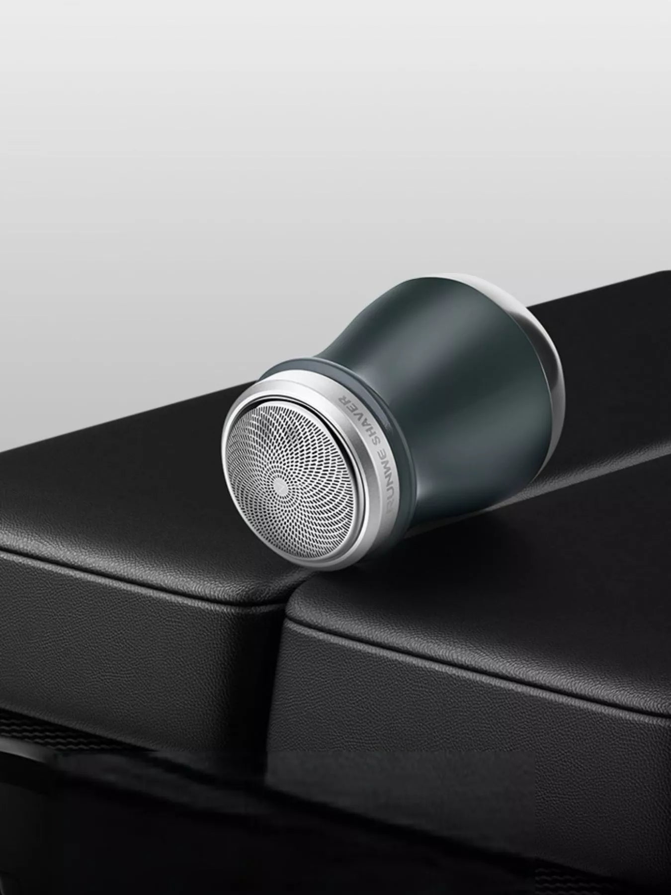 Trendsi portable mini electric shaver in orange, compact design for easy grooming and shaving on the go.
