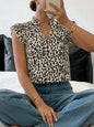 Orange-red leopard print ruffle sleeve blouse by Trendsi, featuring a stylish ruffle detail and vibrant animal print fabric.