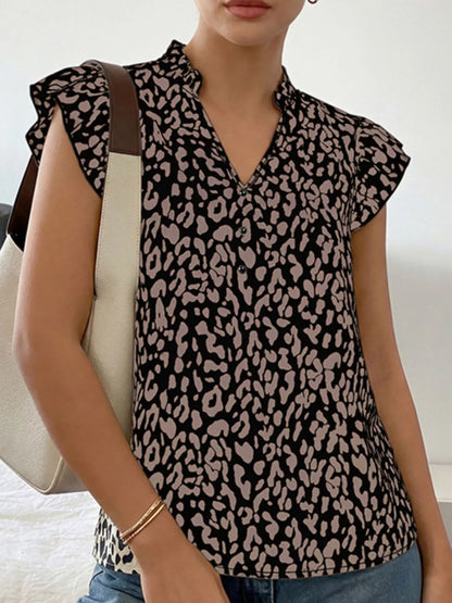 Orange-red leopard print ruffle sleeve blouse from Trendsi, featuring a stylish fit and bold animal print design.